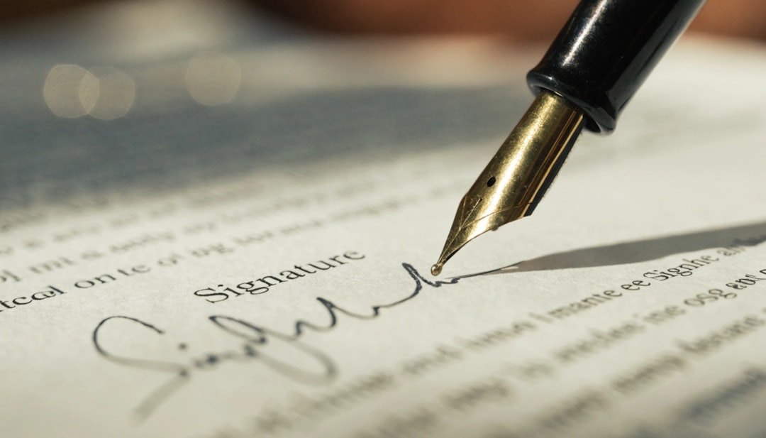 a-fountain-pen-writes-a-signature-on-a-document-lxhoiqqhrvq